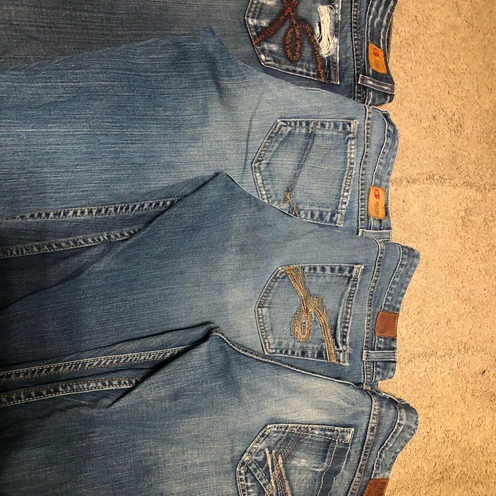 (4) Womens BKE Dark Blue Denim Jeans size 33x 35 1/2 long.